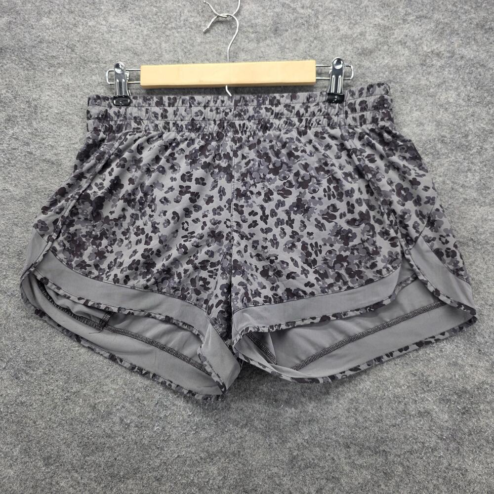 Athleta Running Shorts Womens Medium Leopard Print Lined Zip Pocket Athletic